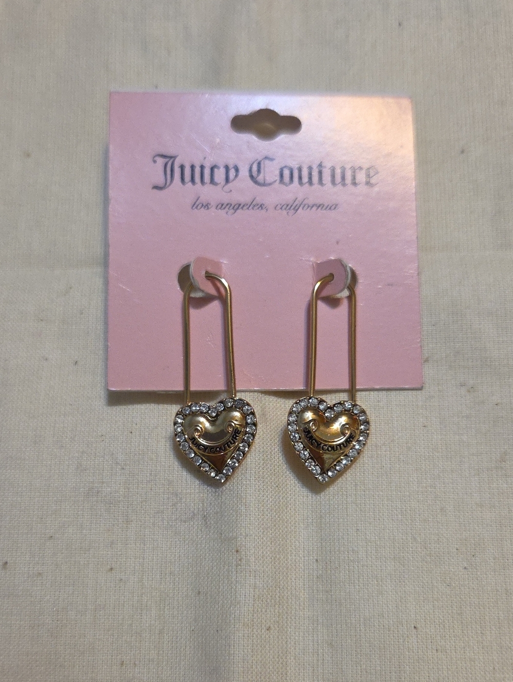 Juicy Couture Gold Heart Drop Earrings with Clear Crystals on Pink Card